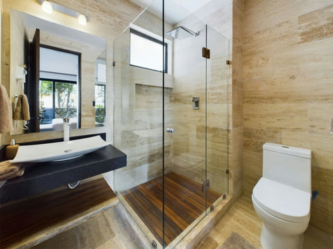 Discover exquisite bathrooms boasting sophisticated, elegant finishes. Embrace luxury and charm in these beautifully designed spaces, perfect for unwinding in style.