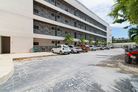 Ample parking area within the building premises, A convenient option for guests with private vehicles.