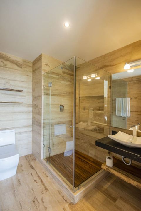 Step into our pristine bathroom, thoughtfully equipped with all the essentials, ensuring your stay is both modern and comfortable.