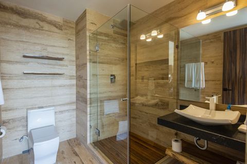 Experience our contemporary bathroom, meticulously furnished with essentials, providing a relaxing haven during your stay.