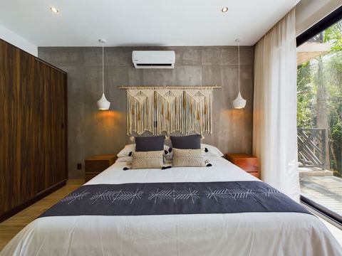 Indulge in our serene master bedroom featuring a luxurious king-size bed, Smart TV, and a private balcony—crafted for your utmost comfort and enjoyment.