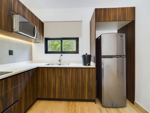 Stunning contemporary kitchen, fully equipped for preparing delicious meals during your stay—perfect for culinary enthusiasts and casual cooks alike.