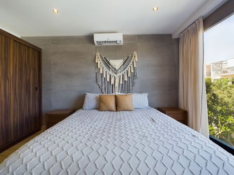 Rest easy in our spacious Master Suite #1 featuring a plush king bed and ensuite bathroom—your private retreat in Tulum!