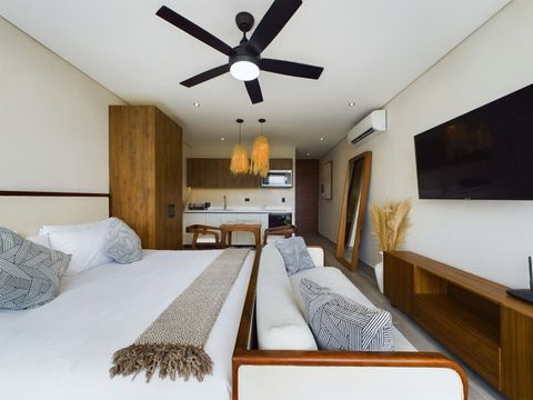 The living space is equipped with a brand new and hyper comfortable king size bed. You'll also find a big Smart TV with all the apps pre-installed