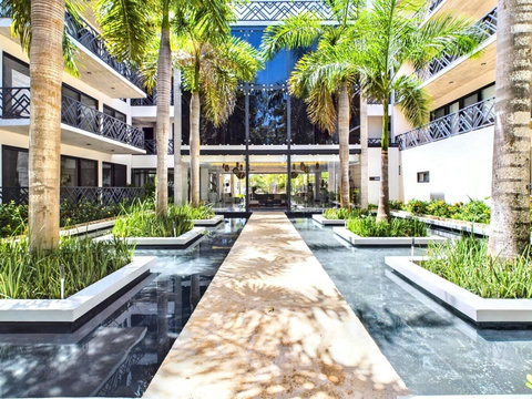 Once you pass the reception area you will enter the shared gardens with various ponds and artificial pools. The entrance of Palais is majestic and makes for a perfect arrival in Tulum!