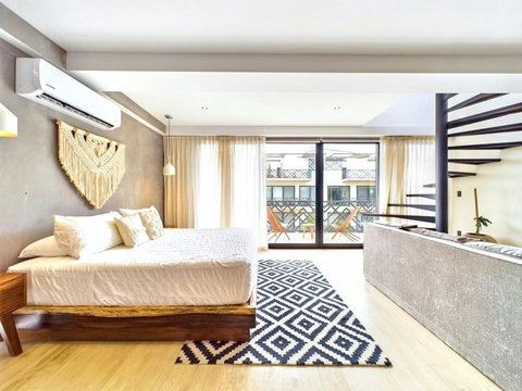 The second bedroom functions like an independent apartment with everything you might need. Direct access to a private terrace right in front, plenty of natural light available. The bedding is hotel grade and brand new, perfect for a good night sleep!