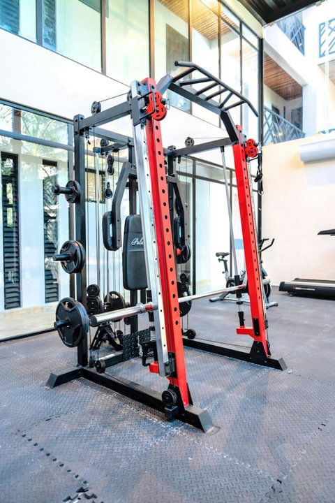Inside the gym you will find a large bench press with plenty of weights