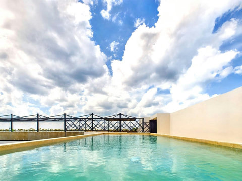 Both rooftop swimming pools are connected, one is perfect for swimming and the other is perfect for hanging and catching some sun
