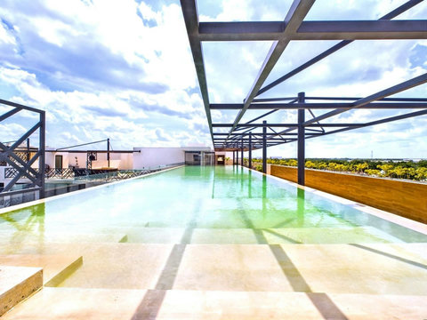Multiple rooftop pools are available but the main one is a huge olympic size swimming pool where those who enjoy swimming long distance will have a great time. The view from up there is also top notch!