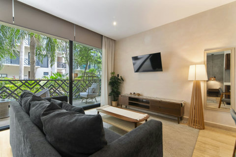 Relax in our spacious living room, complete with a smart TV offering all your favorite streaming apps for the perfect entertainment after a long day!