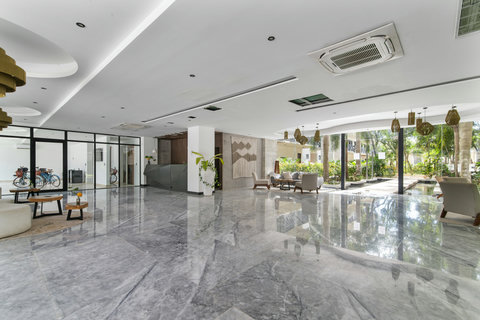 Welcome to our lobby, a cozy reception area with a variety of seating options, creating a warm and welcoming atmosphere to greet our guests upon arrival.