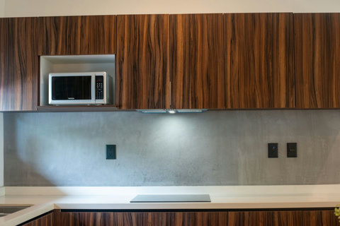Enjoy ample countertop space in our modern kitchen, perfect for preparing delicious meals and experimenting with your favorite recipes!