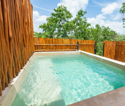 Revel in sunlit relaxation at our soothing private pool, a place where every moment is bathed in relaxation and warmth.