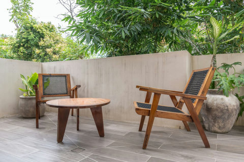Step right outside your bedroom to this peaceful balcony, perfect for sipping morning coffee or unwinding.