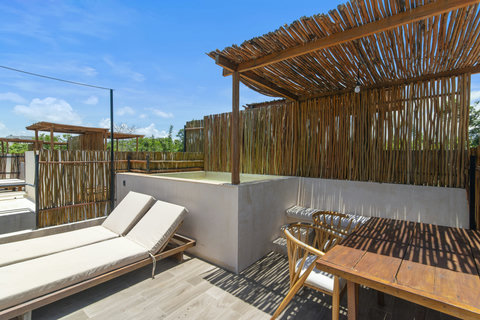 Enjoy your private rooftop with a plunge pool and comfortable lounge seating, the perfect spot to unwind and watch the sunset.