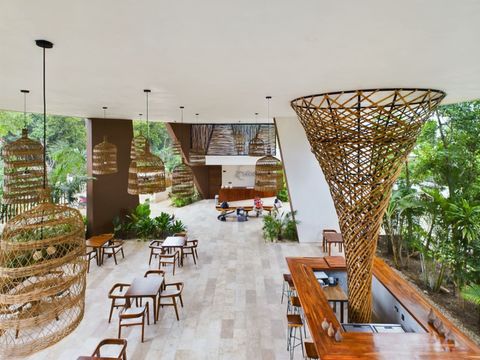 Experience luxury from the moment you arrive at our modern reception! With a welcoming ambiance and stunning design, our property boasts VIP amenities, including a state-of-the-art gym and a gorgeous pool. Your Tulum escape awaits!