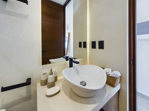 Discover ultimate comfort in our stunning bathroom featuring a large walk-in shower and ample storage space! With plenty of natural light flooding the area, it’s designed for both functionality and elegance. Book your stay today!