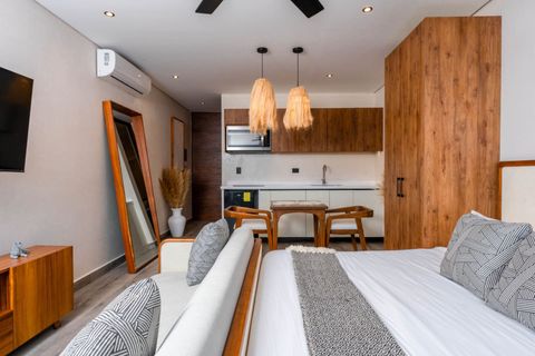 Indulge in restful nights in our beautifully designed sleeping area! With a plush bed and soothing colors, it’s your perfect oasis for unwinding after exploring Tulum. Book your luxurious retreat today!