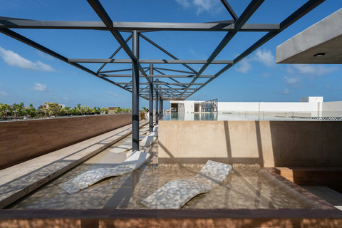 Immerse yourself in the serenity of our terrace pool—an ideal retreat to relax and enjoy the open sky, embraced by natural beauty.