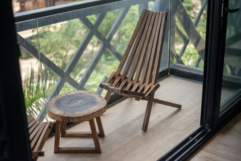 Unwind on the terrace with elegant seating and serene garden views—perfect for sipping coffee, reading, or enjoying quiet moments.