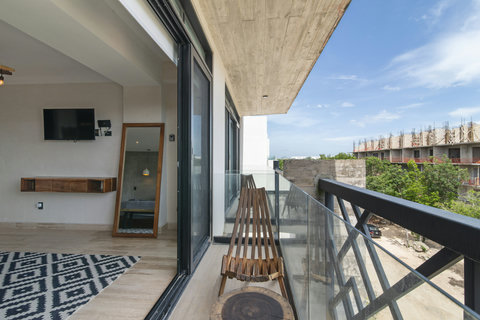 Soak in peaceful views from your balcony, nestled in the calm and beauty of nature.