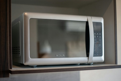 Enjoy the convenience of a modern microwave—perfect for quick meals and effortless cooking during your stay.