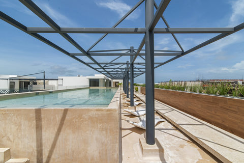 Unwind by the poolside, embraced by elegant design and peaceful surroundings.