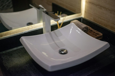 A calming bathroom vibe with natural textures and contemporary design.
