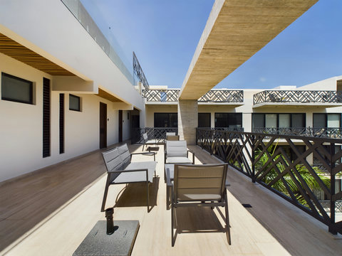 Soak up the sun or connect with others on our spacious terraces—designed with care to make every moment in stunning Tulum truly special.