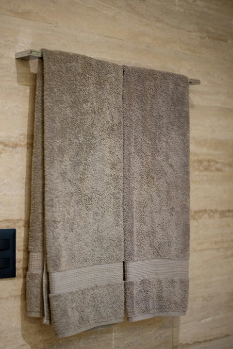 Soft, fresh towels ready for your shower or beach day—comfort meets convenience.