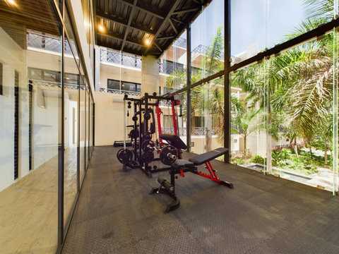 Stay on track with your fitness goals in our fully equipped gym, designed to support every type of workout and inspire your wellness journey.