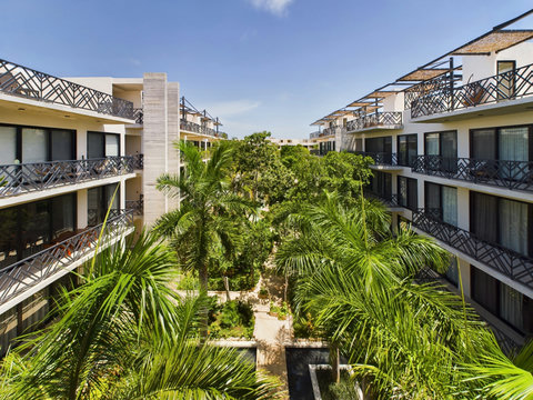 Palais features a lush interior garden that brings calm and beauty. Each terrace offers a private and scenic view to relax and unwind.
