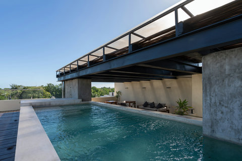 Unwind in this tranquil rooftop pool with plenty of natural light and refreshing open views.