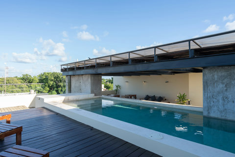 Relax at this rooftop pool surrounded by open views, a quiet escape to enjoy sunrise or sunset.