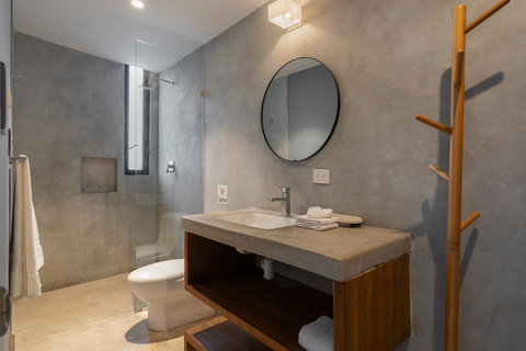 This elegant bathroom blends warm finishes with a fresh, inviting atmosphere. Its clean design and cozy feel make it the ideal space to refresh, unwind, and begin or end your day with ease.