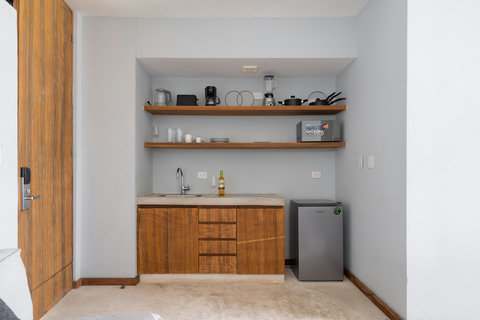 This charming kitchen is fully equipped and cozy, ideal for cooking, dining, and enjoying relaxed, memorable moments in a comfortable, welcoming space.