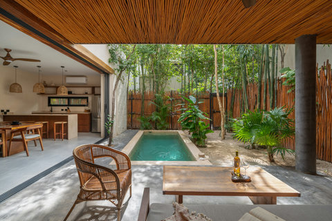 A stylish indoor-outdoor villa with a private plunge pool, natural materials, and lush surroundings. The open layout invites easy living, offering a peaceful tropical vibe perfect for unwinding.