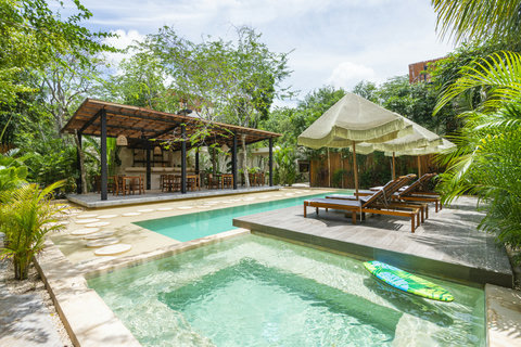 Unwind by our stunning pool, surrounded by elegant details and lush natural scenery. A serene retreat designed for relaxation, sun-soaked moments, and peaceful escapes.