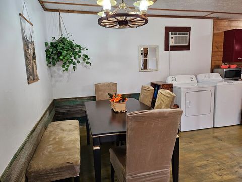 Dinning Table, Washer, Dryer, and Laundry Detergent Shelf