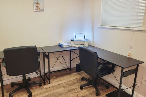 Office with Computer Desks, Chairs, Printer, Mouse, and Keyboard