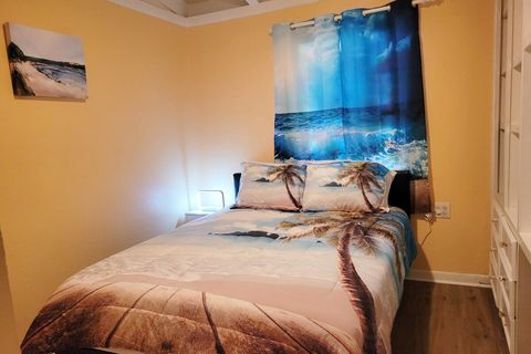 Bedroom 2 with Queen Bed and Large Storage Shelf