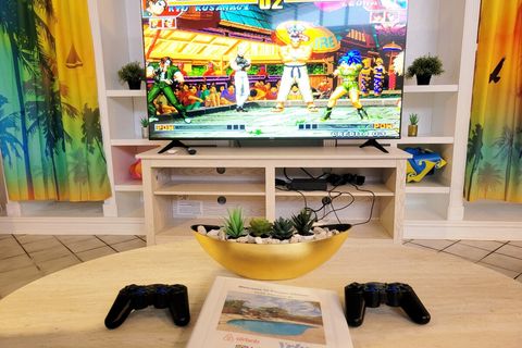 65'' Smart TV with Google Chromecast for Netflix, YouTube etc.& 5000-Game Arcade
