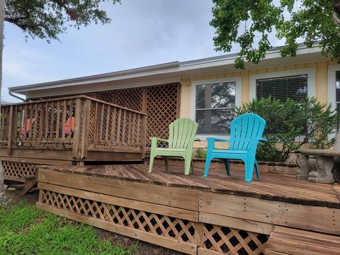 Huge Deck with Chairs in the Backyard