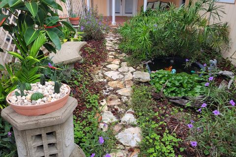 Garden with Pond and Bench