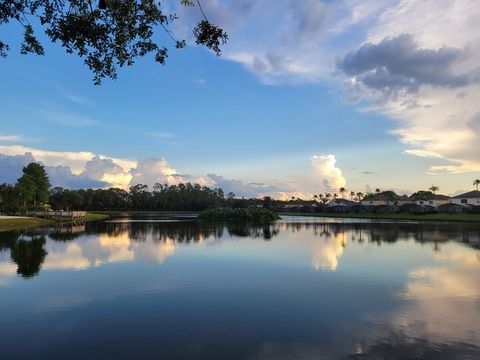 The lake at the resort with a small island full of birds.