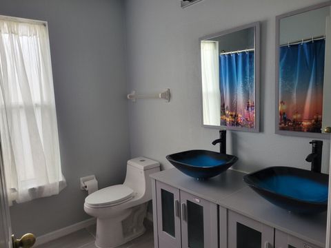 Upstairs, Disney-themed bath room with dual vanities.