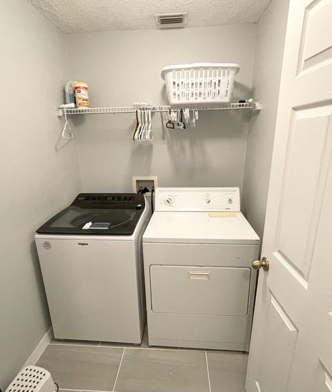 Downstairs laundry room with washer tablets to get you started with.