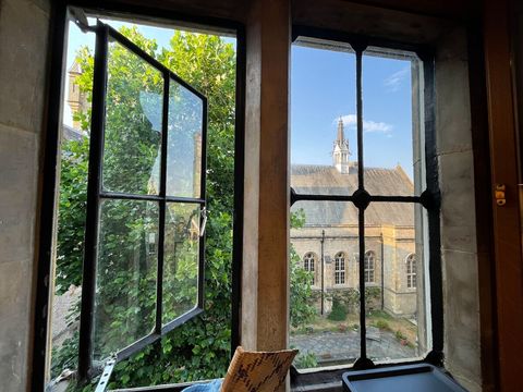 View from the kitchen window showing the communal courtyard and water feature! 