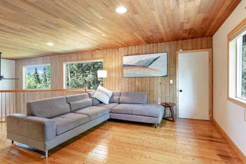 Sleeper sofa for sleeping space in addition to the four beds in bedrooms.