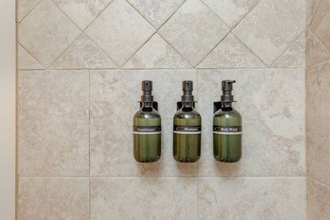 Shampoo, conditioner and body wash provided.